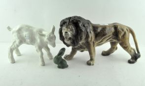 A group of three ceramic animals, to include a Melba ware lion,