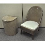 A Lloyd Loom chair with matching linen basket,