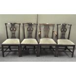A group of four Georgian mahogany dining chairs,
