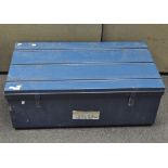 A large metal blue trunk