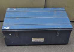 A large metal blue trunk