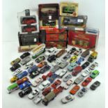 A collection of Die cast model vehicles, including examples by Matchbox, Burago, Corgi and others,