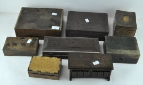 A selection of wooden boxes of varying designs, including carved inlaid example,