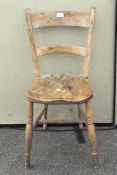 An early 20th century single chair, raised upon turned supports,