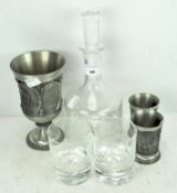 Three Austrian pewter goblets together with a Dartington crystal glass decanter and two glasses