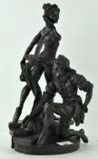 A bronzed figure depicting a ballerina with fellow dancer, signed to base R Cameron,