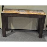 A modern hard wood side table, of rectangular form,