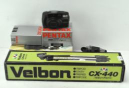 A Pentax zoom 105 super compact camera with related accessories, in original boxes,