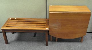 A modern drop leaf table,