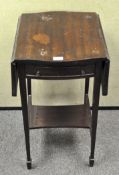 A mahogany drop leaf occasional table with drawer to one side,