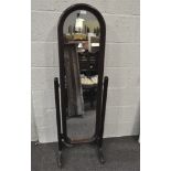 A 1930s mahogany framed cheval mirror on splayed supports,