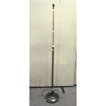 A brass and stee telescopic standard lamp