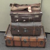 Two wooden bound trunks, a suitcase and a canvas bag with White Star line paper label,