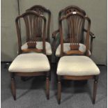 Four dining chairs by William Bartlett, including one carver,