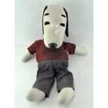A vintage 1950's soft Snoopy toy, wearing original "the gangs all here" shirt,