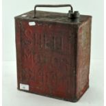 A vintage red painted Shell Motor Spirit fuel can,