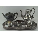A collection of silver plate to include a tray and coffee pots