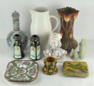 A collection of ceramics, including pair of green vases modelled as thistles,