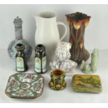 A collection of ceramics, including pair of green vases modelled as thistles,