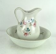 A Burleigh ironstone Staffordshire wash bowl and matching jug,