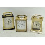 Three modern carriage clocks, each with Quartz movements,