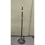 An oak barley twist standard lamp, height 173cm,
