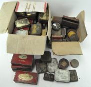 A large quantity of empty vintage tins, including tobacco,