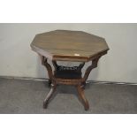 A mahogany hexagonal occasional coffee table