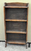 A 20th Century four tier oak bookcase,