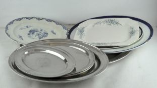 A quantity of serving trays and platters, including ceramic meat plates, metal trays etc,