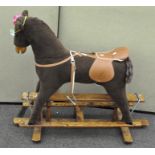 A modern rocking horse by Mama's & Papas,