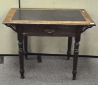 A late 19th century desk with leather inset top, single drawer to front,