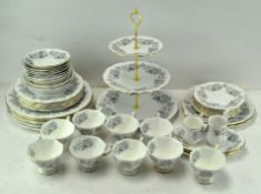 An extensive Royal Albert Silver Maple pattern service, including teacups, dinner plates,