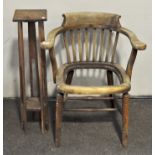 A Victorian wooden spindle backed armchair,