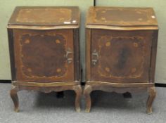 Two French style serpentine bedside cabinets