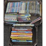 A collection of children's books, including Beano Annuals,