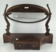 A Regency style mahogany and inlaid toilet mirror,