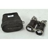 A pair of of 20th century 8 lens binoculars,
