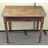 A Victorian mahogany side table, with two short drawers to the front,