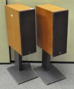 A pair of Meridian M2 speakers, designed by Boothroyd Stuart, on original stands, 86cm high,