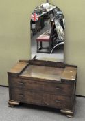 A dressing table with mirror top above two long drawers
