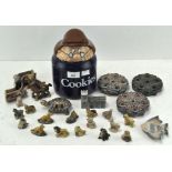 A collection of approximately fifteen Wade whimsies, featuring, cats, dogs and horses,