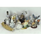 A collection of assorted ceramic figures and others,