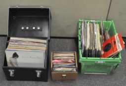 A collection of vintage vinyl albums and singles records (two cases)