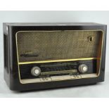 A vintage wooden housed Grundig radio, made in West Germany,
