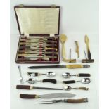 A collection of antler handled cutlery, including a silver-mounted carving set,