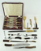 A collection of antler handled cutlery, including a silver-mounted carving set,