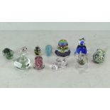 A collection of assorted glass animals and paperweights, including a seal,