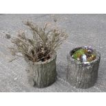 Two garden urns in the form of naturalistic tree stumps,