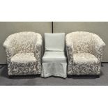 A pair of floral tub chairs,